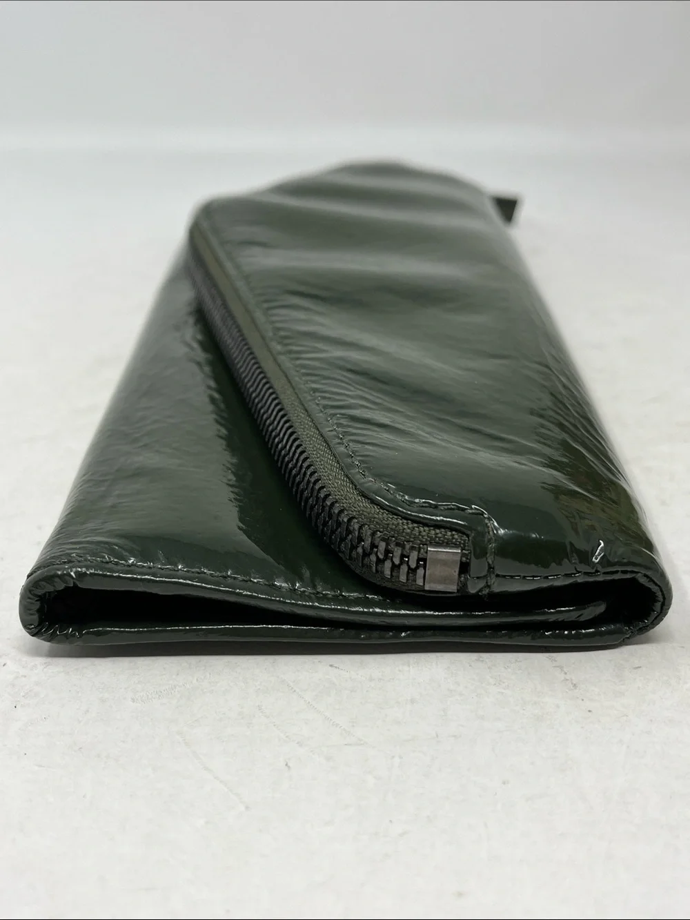 HOBO INTERNATIONAL CLUTCH WALLET ASYMMETRICAL ZIPPER PATENT LEATHER FOREST GREEN